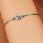 Fancy Light Blue Stone Cord Bracelet in Sterling Silver